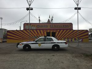 Kysmet Security and Patrol Car in front of circus
