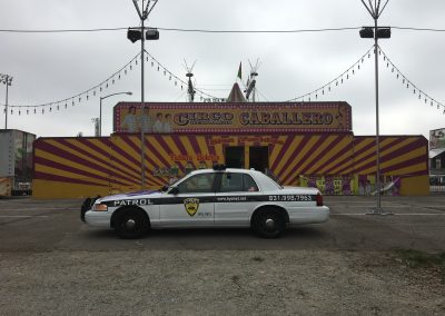 Kysmet Security and Patrol Car in front of circus